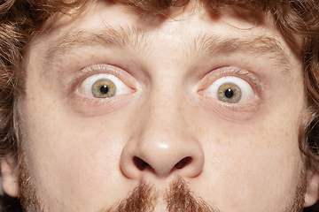 Image showing Close up of face of beautiful caucasian young man, focus on eyes