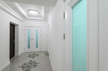 Image showing interior of white hallway with doors