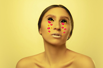 Image showing Tears illustrated of social media activity signs on female face in neon light. Real life versus online lifestyle, addiction to modern technologies