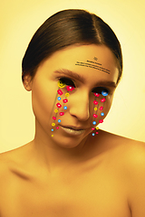 Image showing Tears illustrated of social media activity signs on female face in neon light. Real life versus online lifestyle, addiction to modern technologies