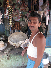 Image showing Man cooking on the street in Kolkata, West Bengal, India 