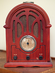 Image showing antique wooden radio with large frequency dial