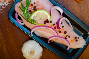 Image showing fresh organic chicken breast with herbs and spices