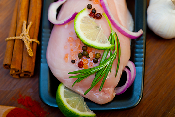 Image showing fresh organic chicken breast with herbs and spices