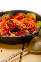 Image showing roasted shrimps with zucchini and tomatoes