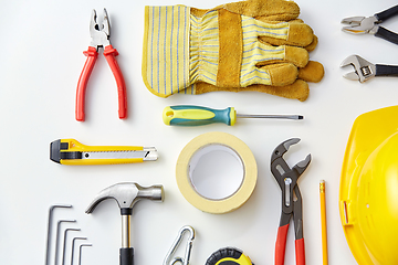 Image showing different work tools on white background