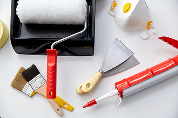 Image showing different painting work tools on white background