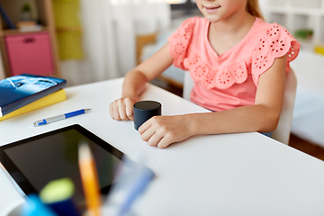 Image showing student girl using smart speaker at home