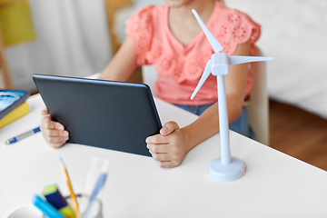 Image showing student girl with tablet pc and wind turbine