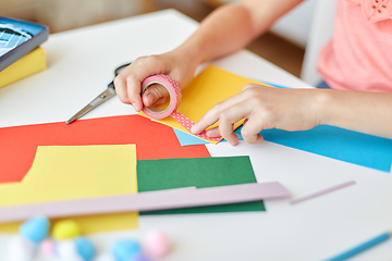 Image showing creative girl making greeting card at home