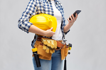 Image showing woman or builder with phone and working tools