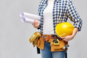 Image showing builder with helmet, blueprint and working tools