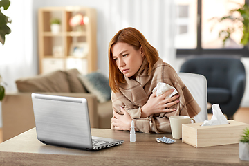 Image showing sick woman having video call on tablet pc at home