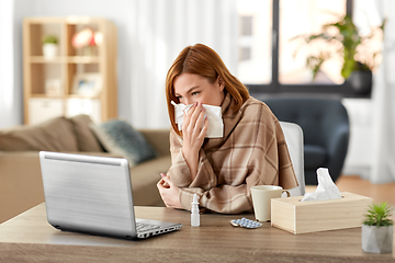 Image showing sick woman having video call on tablet pc at home