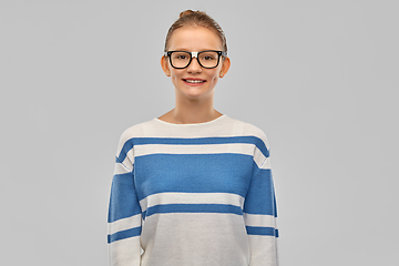 Image showing smiling teenage student girl in glasses