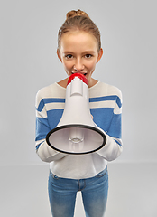 Image showing teenage girl speaking to megaphone