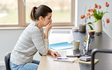 Image showing woman with laptop working at home office