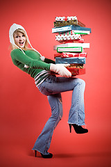 Image showing Caucasian girl with gifts