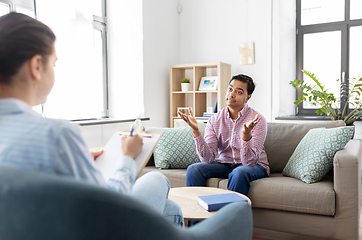 Image showing man and psychologist at psychotherapy session