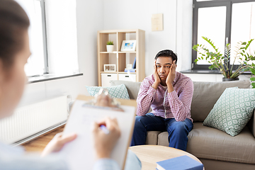 Image showing man and psychologist at psychotherapy session