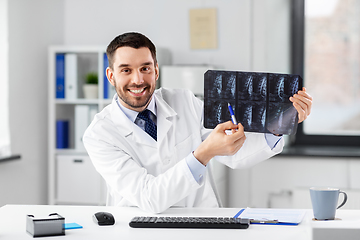 Image showing doctor with x-ray having video call at clinic