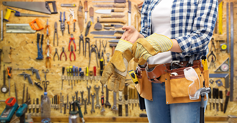 Image showing woman or builder with gloves and working tools