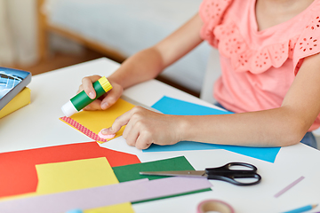 Image showing creative girl making greeting card at home