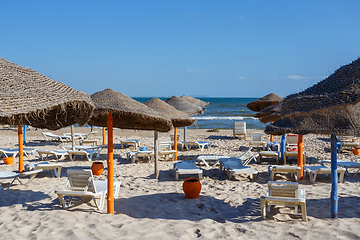 Image showing Beach umbrellas on sandy Tunis beach