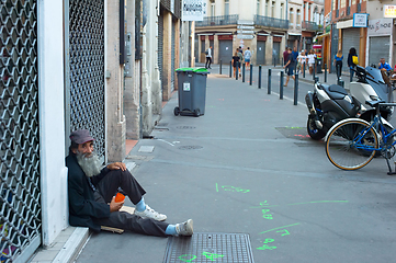 Image showing Homeless man beggar street France