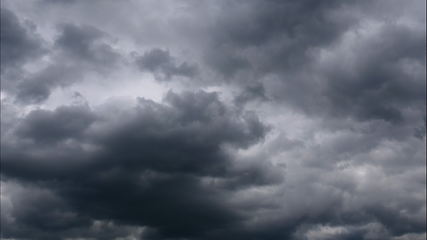 Image showing Time lapse Nature background Ominous clouds drift slowly across the sky, threatening rain. UltraHD stock footage