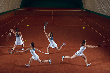 Image showing Young caucasian professional sportswoman playing tennis on sport court background, collage with action concept