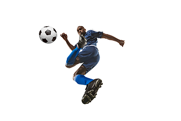 Image showing Football or soccer player on white background - motion, action, activity concept, wide angle