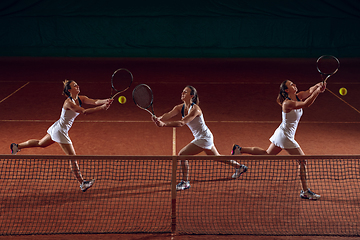 Image showing Young caucasian professional sportswoman playing tennis on sport court background, collage with action concept