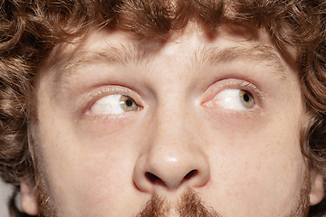 Image showing Close up of face of beautiful caucasian young man, focus on eyes