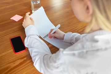 Image showing Young caucasian business woman working in office, diversity and girl power concept, close up