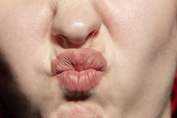 Image showing Close-up female mouth with natural lips make-up. Cosmetology, dentistry and beauty care, human emotions