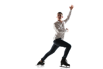 Image showing Man figure skating isolated on white studio backgound with copyspace