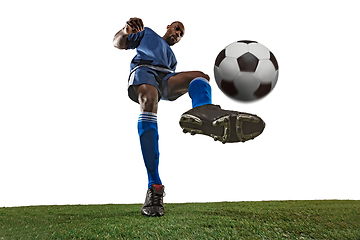 Image showing Football or soccer player on white background - motion, action, activity concept, wide angle