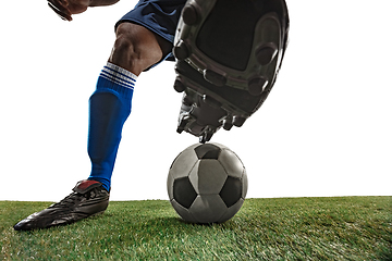 Image showing Football or soccer player on white background - motion, action, activity concept, wide angle