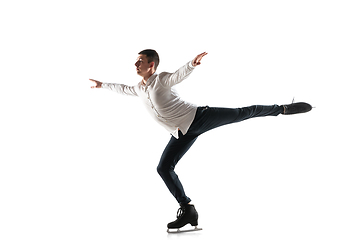 Image showing Man figure skating isolated on white studio backgound with copyspace