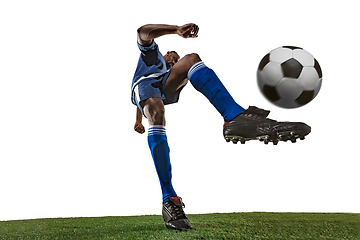 Image showing Football or soccer player on white background - motion, action, activity concept, wide angle