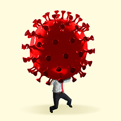 Image showing Man headed by model of COVID-19 coronavirus, concept of pandemic spreading