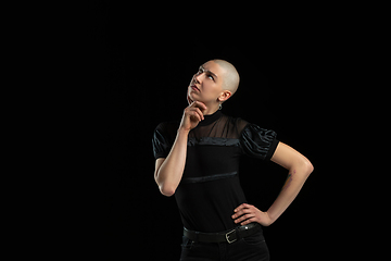 Image showing Monochrome portrait of young caucasian bald woman on black background