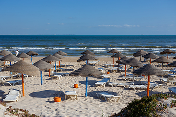 Image showing Beach umbrellas on sandy Tunis beach