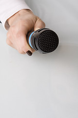 Image showing hand with microphone