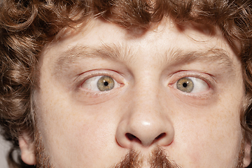 Image showing Close up of face of beautiful caucasian young man, focus on eyes