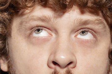 Image showing Close up of face of beautiful caucasian young man, focus on eyes