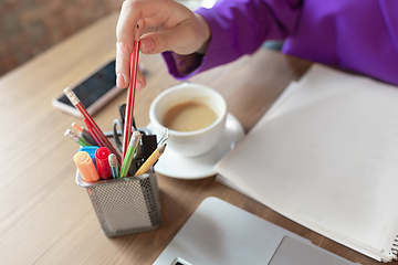 Image showing Young caucasian business woman working in office, diversity and girl power concept, close up