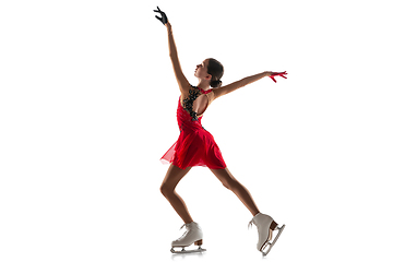 Image showing Girl figure skating isolated on white studio backgound with copyspace