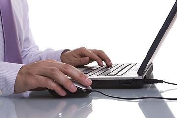 Image showing businessman working with his laptop